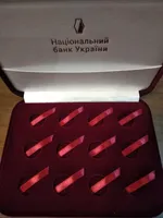 Продам футляр на 12 золотих монет ( знаки зодіаку )