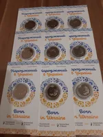 Продам монету Народжений в Україні в сувенірній упаковці (2023 р.)
