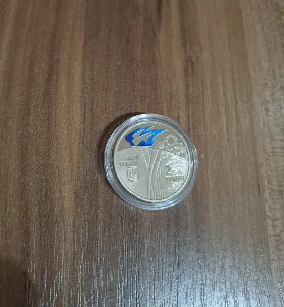 Продам памятную монету XXIII зимние Олимпийские игры (нейзильбер) ,( Пхьончхан, 2018 г.) 1