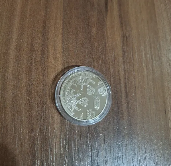 Продам памятную монету XXIII зимние Олимпийские игры (нейзильбер) ,( Пхьончхан, 2018 г.) 2