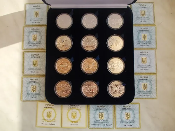 Набір срібних монет "Східний календар" 1